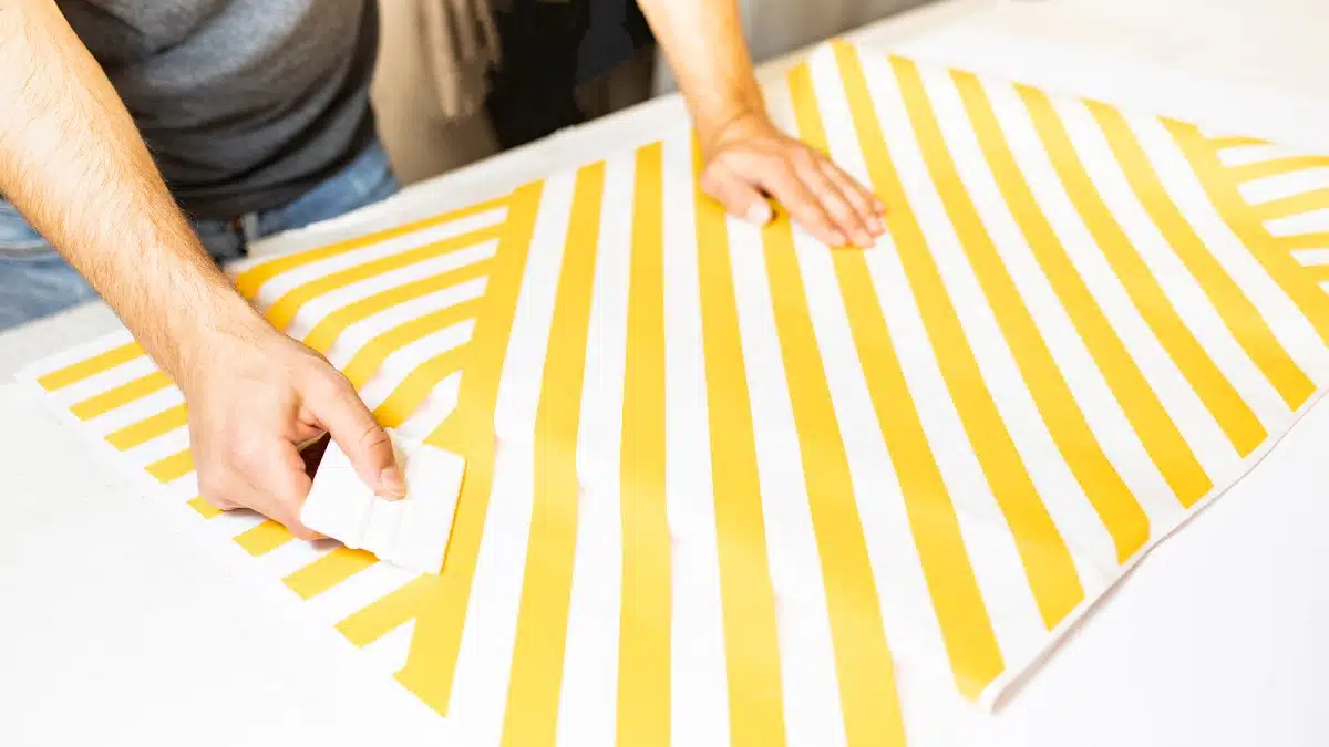 Use Adhesive Wallpaper