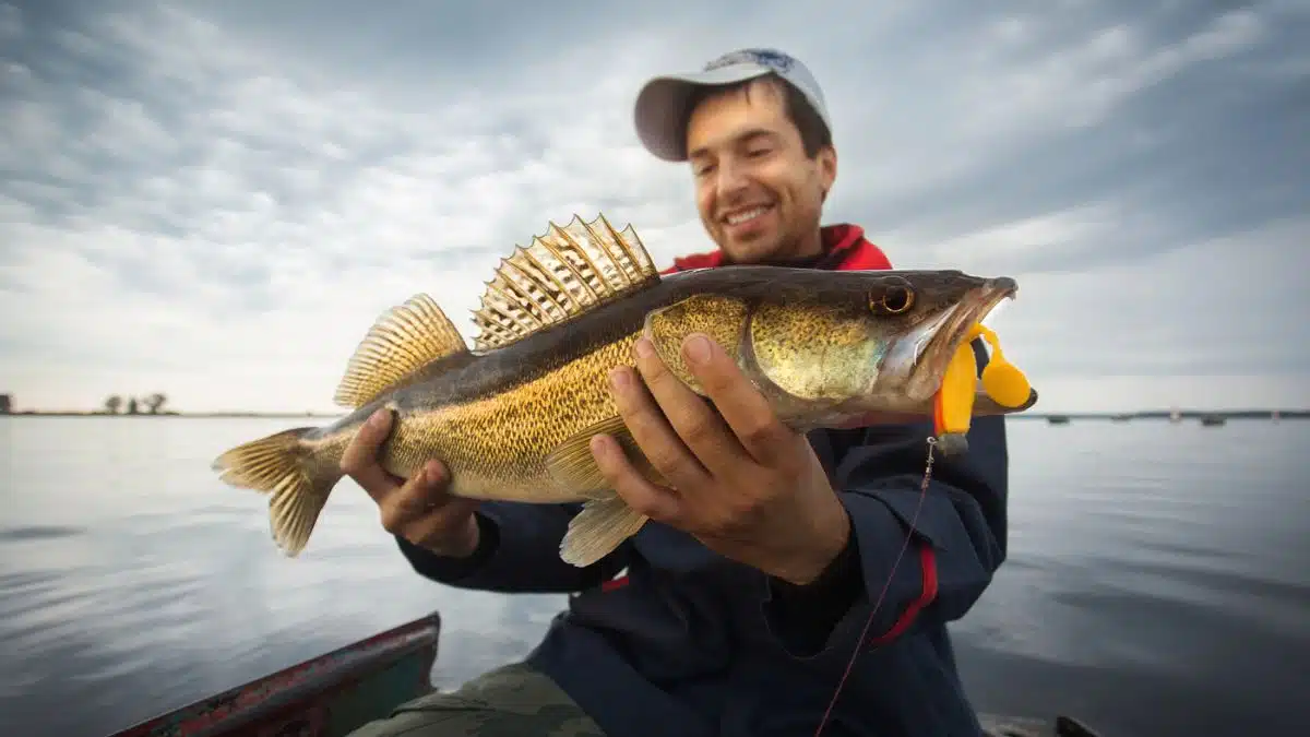 man holding fish