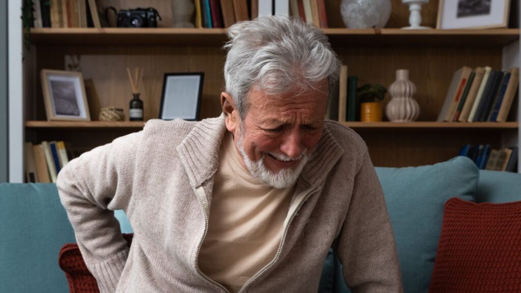 elder man hurting your back