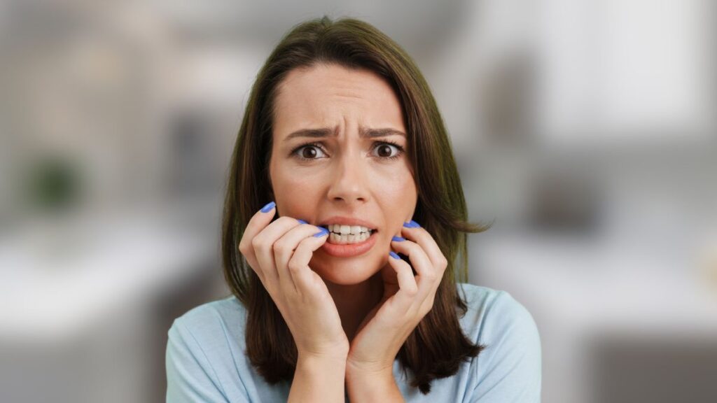 woman regret in kitchen