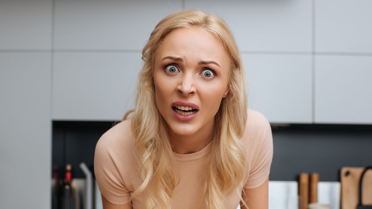 woman shocked staring with big eyes