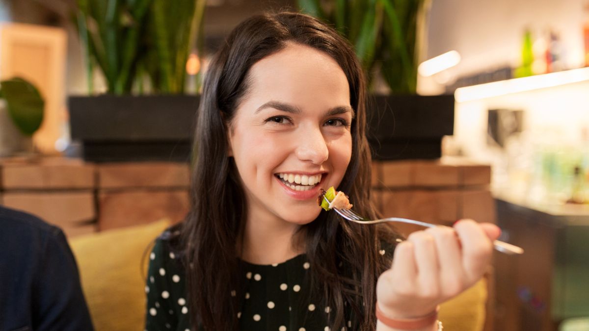 woman eating at a restaurant